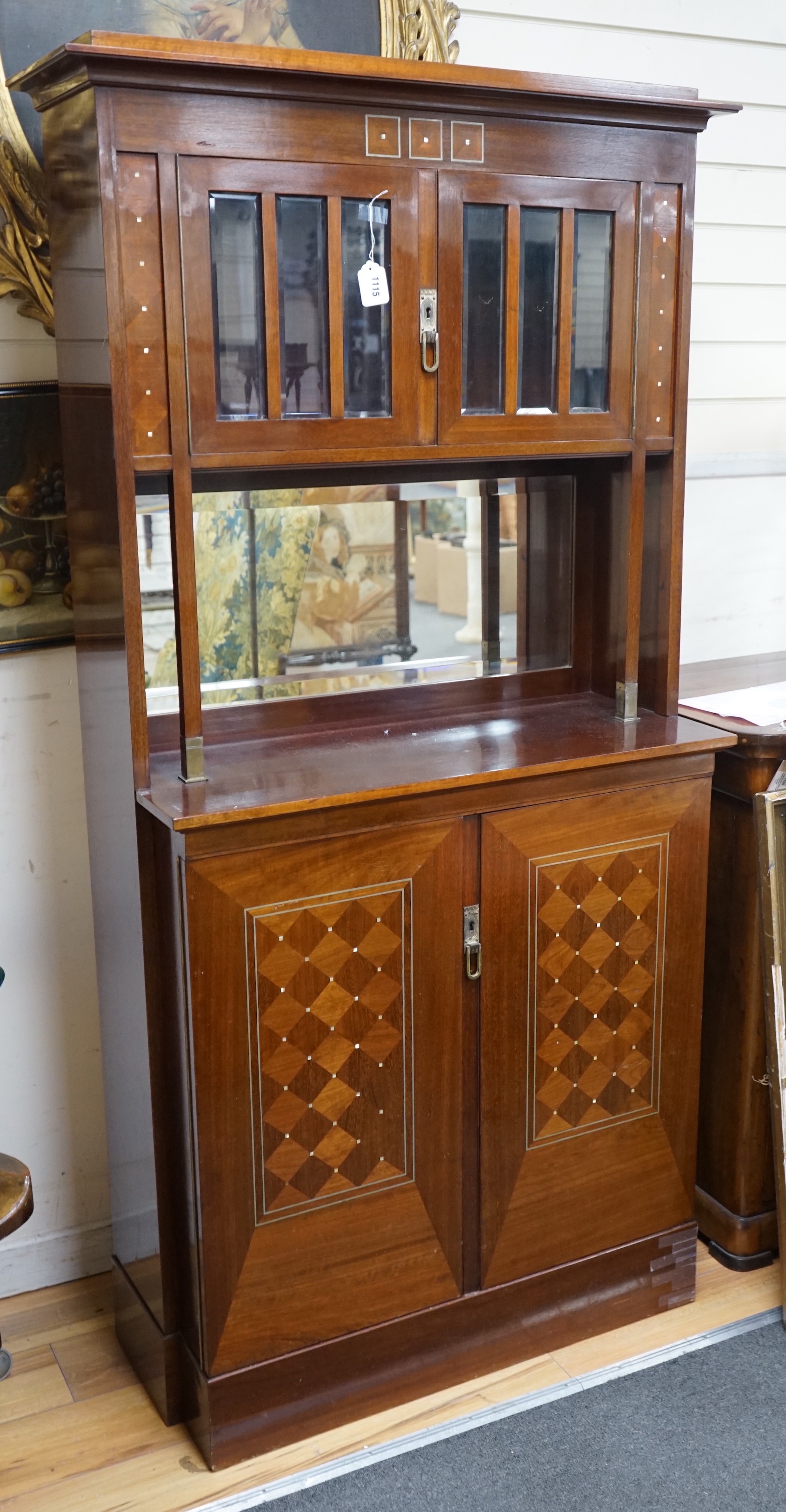 A Secessionist inlaid mahogany side cabinet